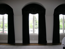 Arched Top Cornice with applied Braided Corded Motif over blackout lined Velvet Draperies